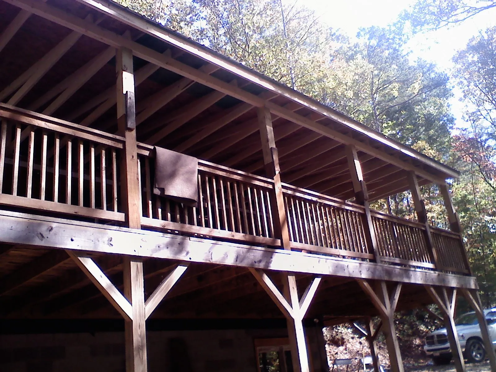 Timber framing under a new elevated porch and deck — Roof Leak Repair in West Wareham by Roofing Brothers